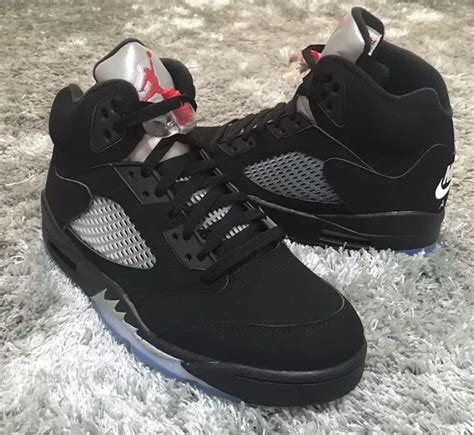 all black air jordan 5